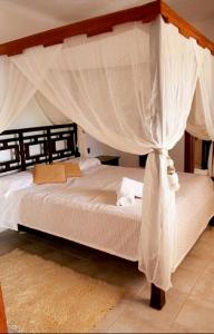 A bed or beds in a room at Villa Can Cosmi