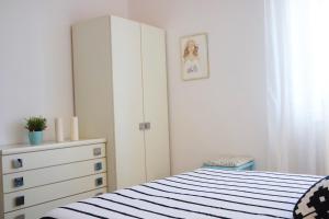 Łóżko lub łóżka w pokoju w obiekcie Eleatica Holiday Apartment