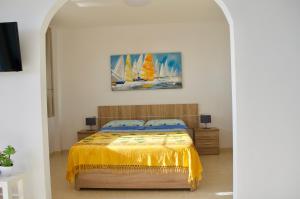 Cama ou camas em um quarto em Residencial Playa Paraiso