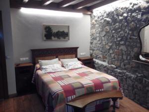 Cama ou camas em um quarto em Posada Montero de la Concha