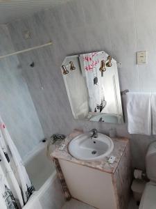 Koupelna v ubytování Hotel Conforto Latino