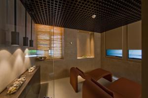 TV a/nebo společenská místnost v ubytování Romantik Seehotel Sonne