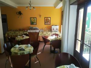Restaurace v ubytování Hotel Conforto Latino