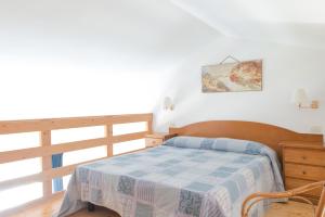 Кровать или кровати в номере Villa Anna Apartments +37 фотографий