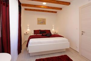 Luxory D-Rooms客房内的一张或多张床位
