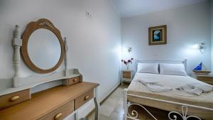 Postel nebo postele na pokoji v ubytování Feakia apartment 2