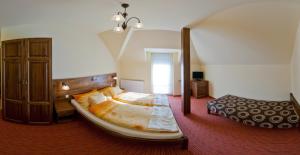 Кровать или кровати в номере Harmónia Wellness Villa