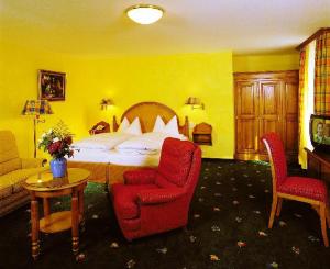Postel nebo postele na pokoji v ubytování Hotel Wilder Mann