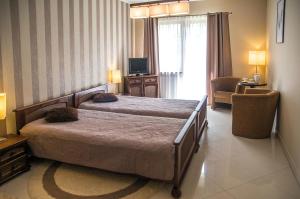 Posteľ alebo postele v izbe v ubytovaní Apartament 6 Cappucino Pod Aniołem