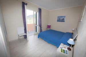Katil atau katil-katil dalam bilik di La Piazzetta Colle d'Orano