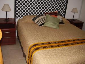 Posteľ alebo postele v izbe v ubytovaní Departamento Sol Cuyano