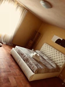 Giường trong phòng chung tại Villino CORTEBOZZINI