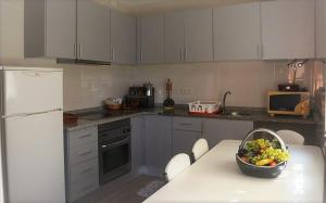 A kitchen or kitchenette at Casa Praia Norte - PVZ