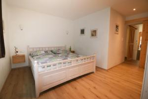 Postel nebo postele na pokoji v ubytování Ferienwohnung Fertsch
