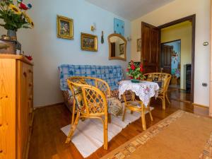 a dining room with a table and chairs at Apartments LUMAR in Dramalj
