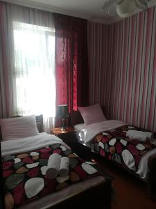 Voodi või voodid majutusasutuse Nikoloz Guesthouse toas