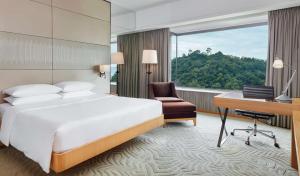 Cama ou camas em um quarto em Hyatt Regency Hong Kong, Sha Tin