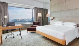 Cama ou camas em um quarto em Hyatt Regency Hong Kong, Sha Tin