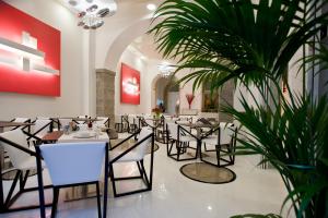 Reštaurácia alebo iné gastronomické zariadenie v ubytovaní Hotel Coppe Trieste - Boutique Hotel