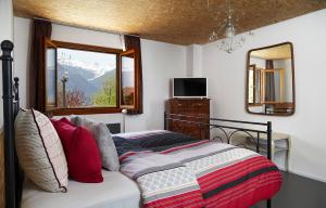 Кровать или кровати в номере B&B La Forge de Diogne