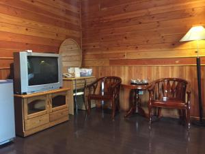 Kuchyň nebo kuchyňský kout v ubytování Yu Ho Yuan Lesiure Homestay