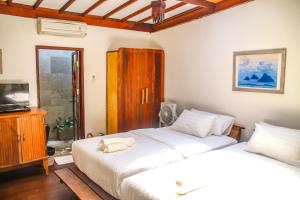 Letto o letti in una camera di Serene Beach Villa