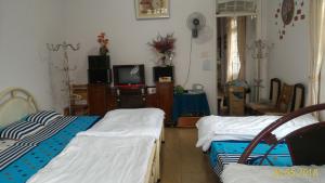 Postel nebo postele na pokoji v ubytování Homstay An Nhien + 37 fotografií