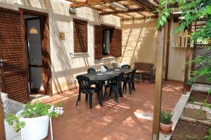 En terrasse eller udendørsområde på casa Francy