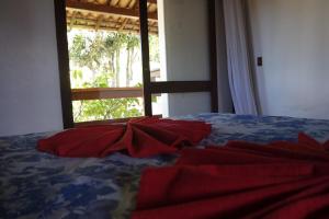 Cama ou camas em um quarto em Residencial Frente a Praia