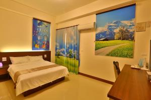 Tempat tidur dalam kamar di Chang Cheng Min Su