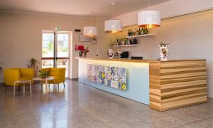 Kuchyň nebo kuchyňský kout v ubytování Hotel Solemar