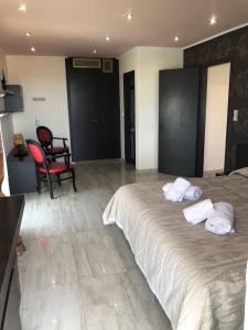 Posteľ alebo postele v izbe v ubytovaní Selefkos Palace