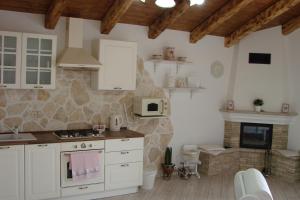 Kuchyň nebo kuchyňský kout v ubytování Apartman Rebecca
