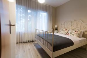 Ένα ή περισσότερα κρεβάτια σε δωμάτιο στο Büyükada Apart Hotel - Karadağ Apart +145 φωτογραφίες