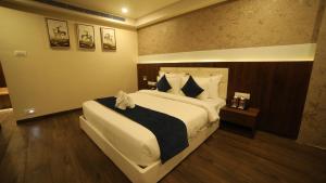 Regenta Central Somnath, Bhalpara客房内的一张或多张床位