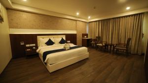 Regenta Central Somnath, Bhalpara客房内的一张或多张床位