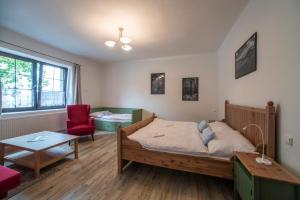 Letto o letti in una camera di Pernštejnův statek