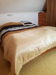 Postel nebo postele na pokoji v ubytování SłonecznyDom (SunnyHome) w Łunowie