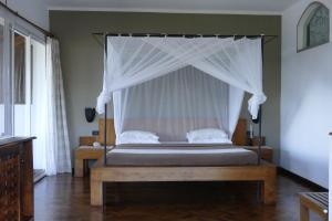 Кровать или кровати в номере Hotel Arc En Ciel