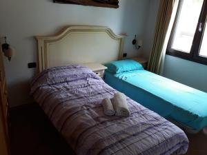 A bed or beds in a room at Villa Veronica