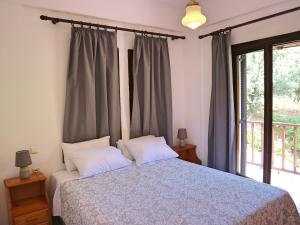 Posteľ alebo postele v izbe v ubytovaní Oliaria Apartments