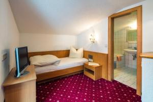 Posteľ alebo postele v izbe v ubytovaní Apart Römerhof