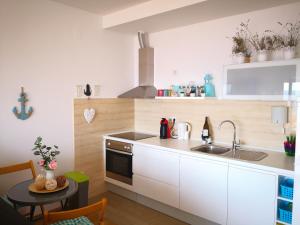 Dapur atau dapur kecil di Apartment Mia