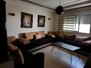 Posezení v ubytování Fnideq Seaside Apartment