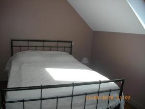 Ліжко або ліжка в номері Les Hortensias