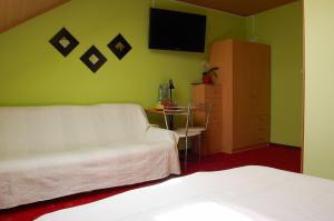 Postel nebo postele na pokoji v ubytování Villa Orchidea