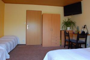 Postel nebo postele na pokoji v ubytování Villa Orchidea