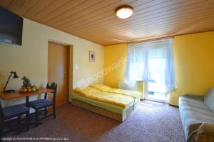 Postel nebo postele na pokoji v ubytování Villa Orchidea