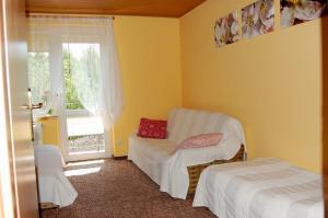 Postel nebo postele na pokoji v ubytování Villa Orchidea