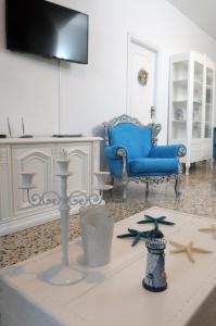 Uma TV ou centro de entretenimento em Cefalù Caldura house